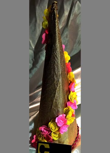 Floral decoration on wallpaper clad Pyramid shaped sweets gifting (‘Shakkarpada’)